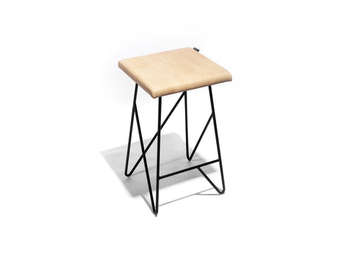 Axis counter stool with welded steel frame and heavy stitched seat cushion.